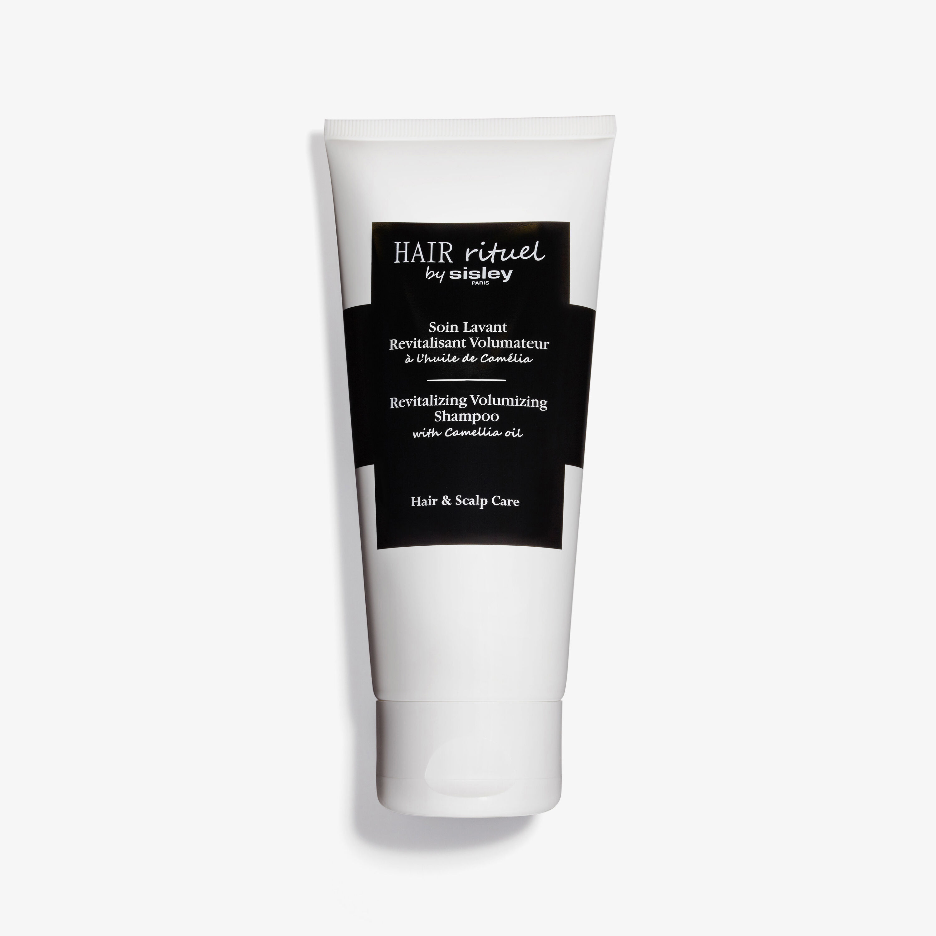 Champú voluminizador revitalizante con aceite de camelia